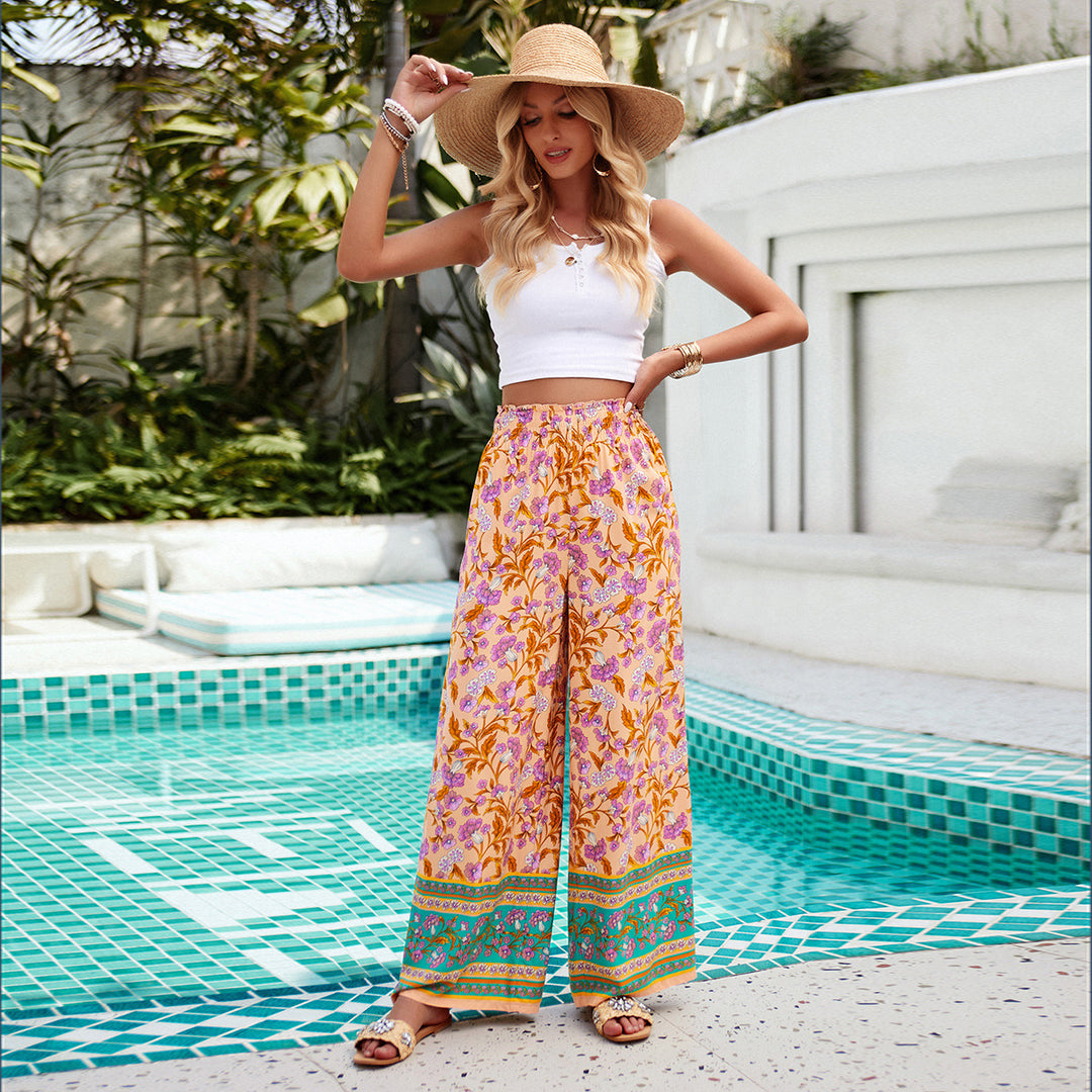 Damen nan weite Palazzohose mit gerafftem Bund, seitlichen Eingrifftaschen und floraler Boho-Print Drune