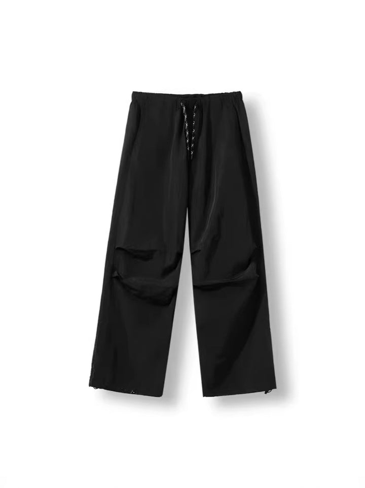 Herren Locker geschnittene Nylon-Trackpants mit Kordelzug, aufgesetzten Taschen und gerader Wide‑Leg-Passform Drune