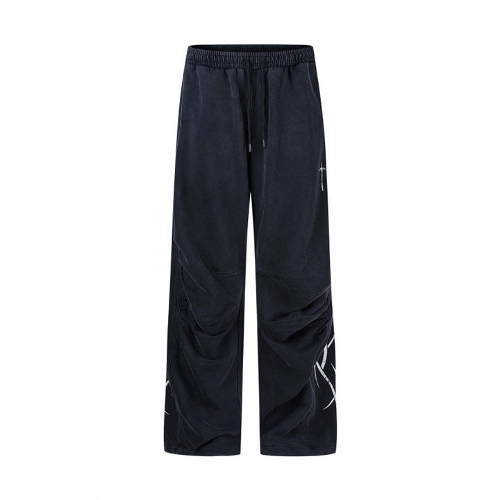 Herren weite Sweatpants im Baggy‑Cut mit Elastikbund, Kordelzug und geraffter Kniepartie Drune