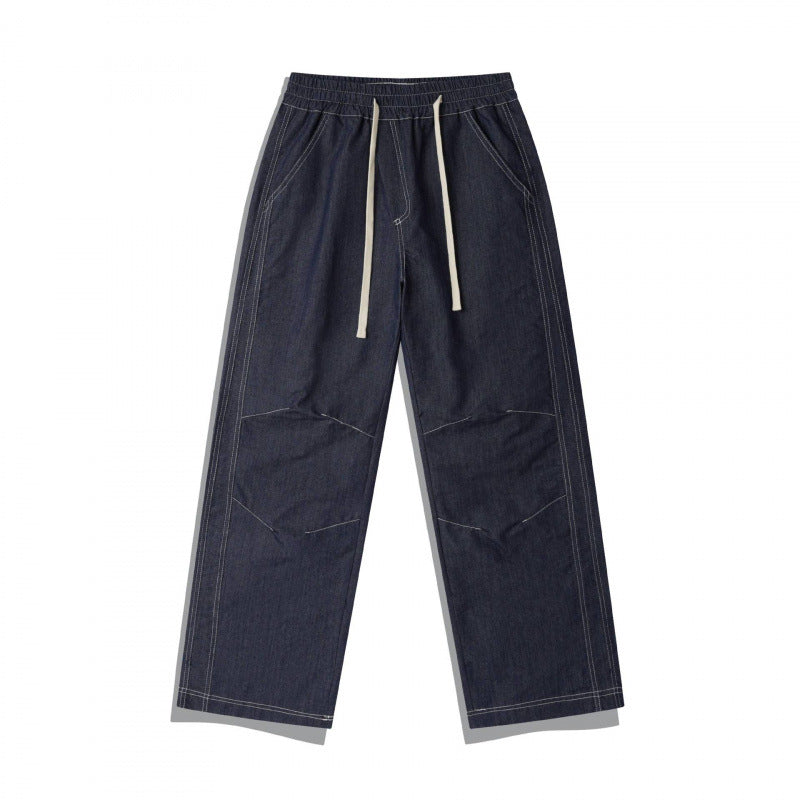 Unisex Weite Denim-Hose mit elastischem Bund, Kordelzug und gesteppter Kniepasse Drune