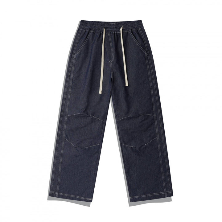 Unisex Weite Denim-Hose mit elastischem Bund, Kordelzug und gesteppter Kniepasse Drune