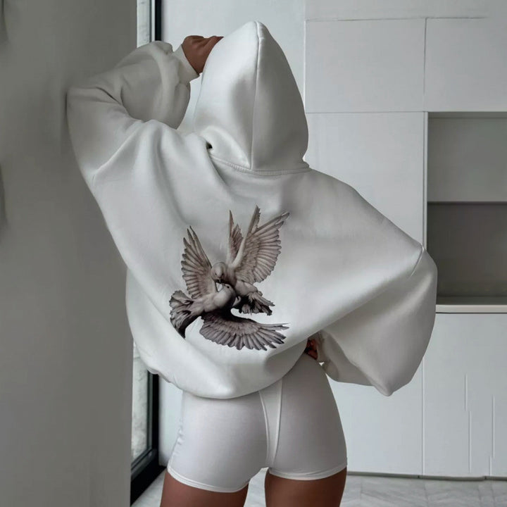 Damen Kapuzensweater mit kunstvollem Vogelmotiv und entspannter Passform Drune