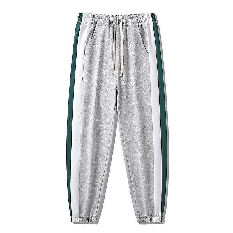 Herren Konische Trackhose mit Kordelzug, seitlichen Colorblock‑Streifen & elastischen Bündchen Drune