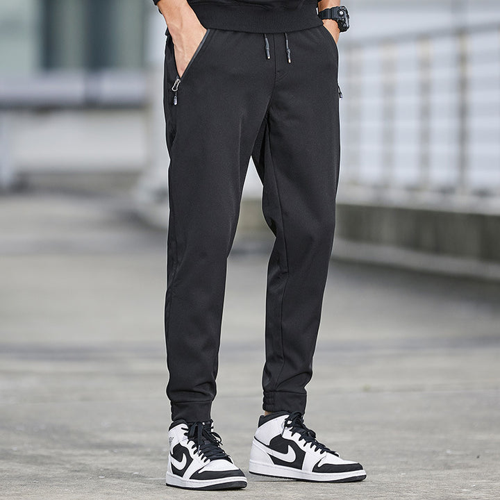 Herren Technische Softshell-Jogginghose mit wasserabweisender Membran, Reißverschlusstaschen und elastischem Kordelbund Drune