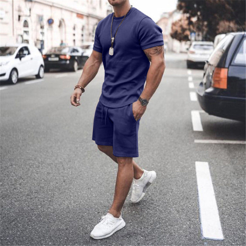 Herren nan figurbetontes Kurzarmshirt mit verstärkter Schulternaht und elastischer Kordelzug-Bermuda aus Stretchjersey Drune