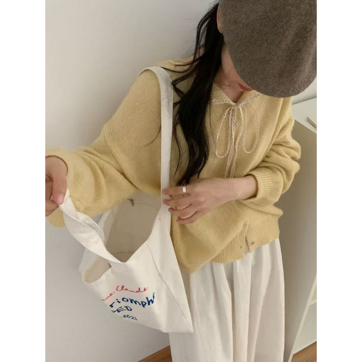Damen Knopf-Cardigan mit romantischem Kordelzug Drune