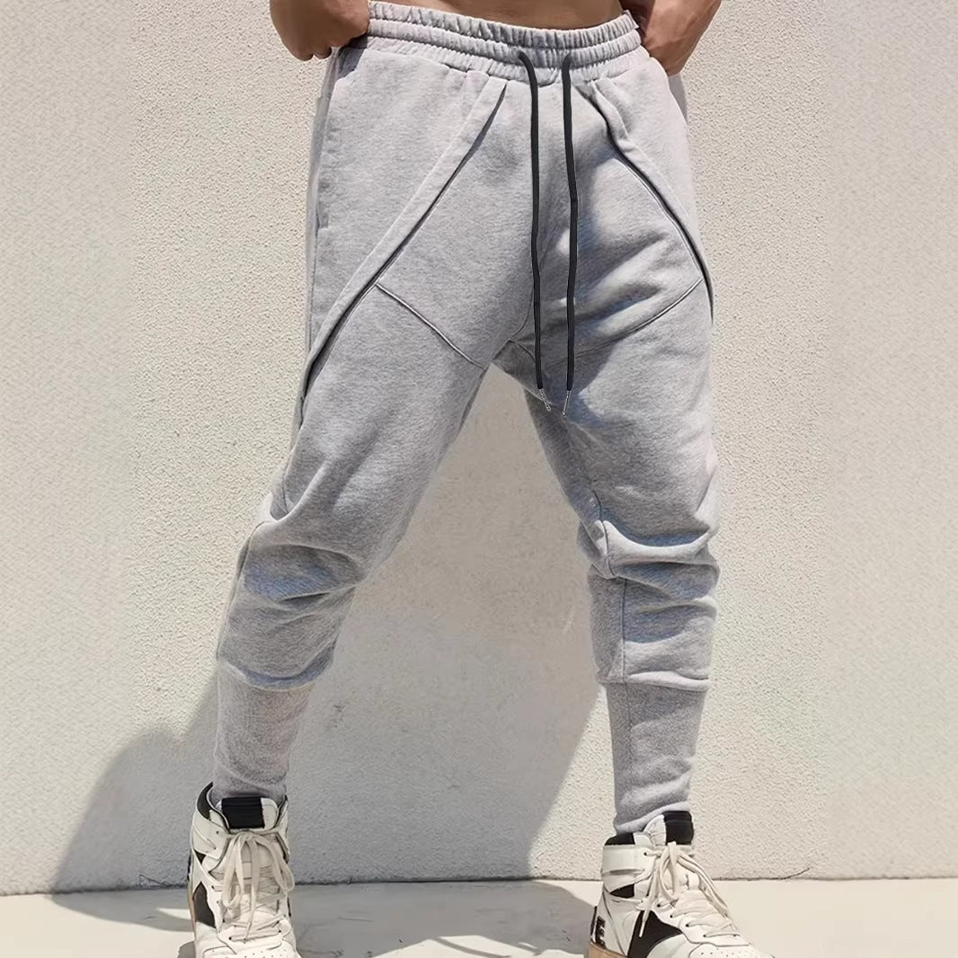 Herren Tapered-Jogginghose mit tiefem Schritt, elastischem Bund & diagonalgesetzten Taschen Drune