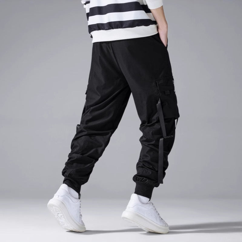 Herren Tech‑Cargo‑Jogger mit taktischen Klappentaschen, verstellbaren Nylonriemen und elastischem Knöchelsaum Drune