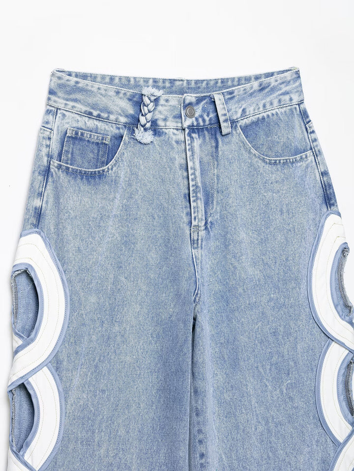 Damen High-Waist-Jeans mit ausgestellter Weitbein-Silhouette und seitlichen Kreis-Applikationen Drune