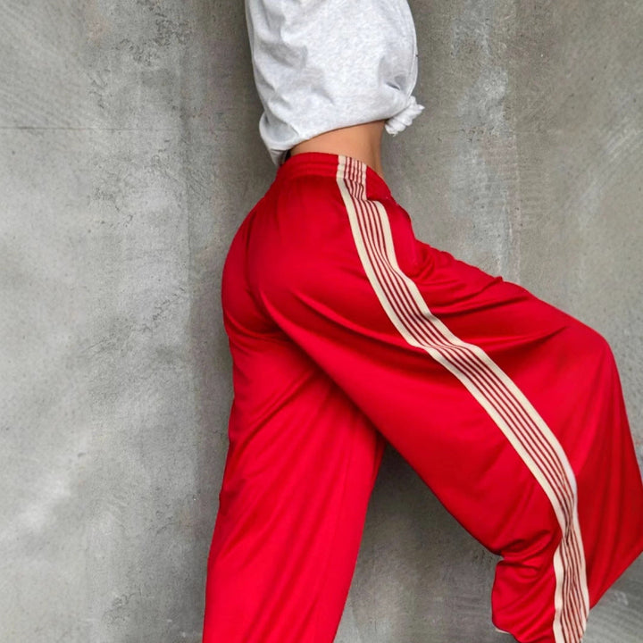 Damen weite Sporthose mit diagonalen Streifen Drune