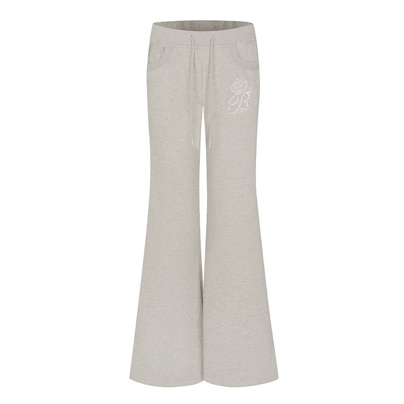 Damen Ausgestellte Loungehose mit hohem Komfortbund, Kordelzug und Strass‑Logo Drune