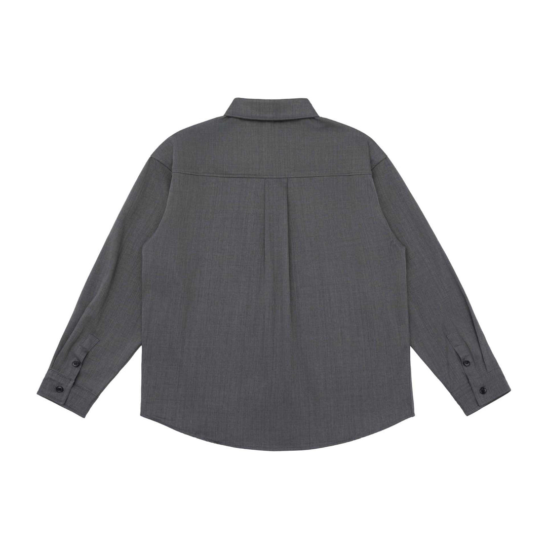 Unisex Oversize Hemdjacke im minimalistischen Workwear Stil mit gerundetem Saum und Brustpattentasche Drune