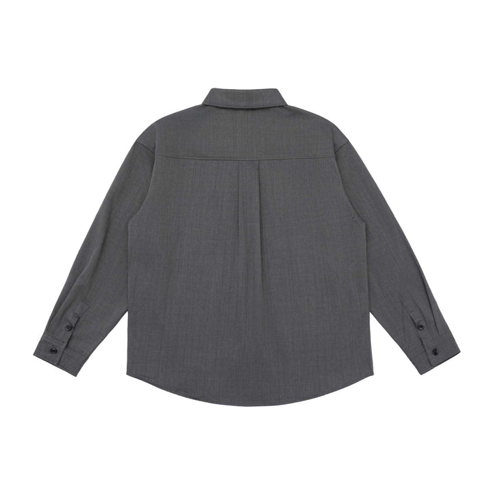 Unisex Oversize Hemdjacke im minimalistischen Workwear Stil mit gerundetem Saum und Brustpattentasche Drune