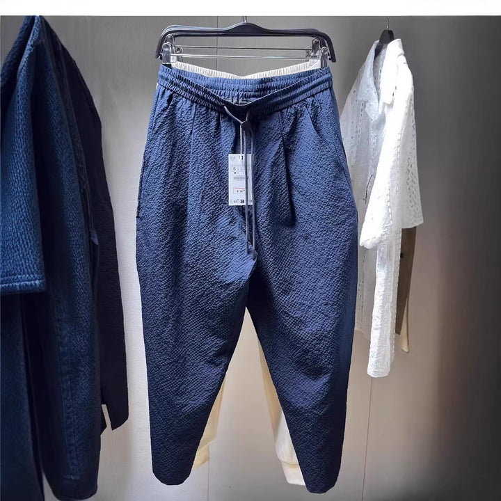 Herren Texturierte Jogginghose mit elastischem Bund Kordelzug und tapered Bein Drune