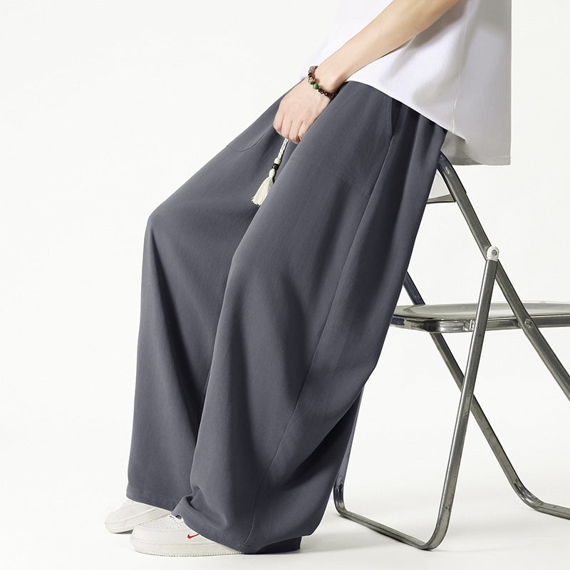 Herren Weit geschnittene Lounge-Hose mit Quasten-Kordel, elastischem Bund und aufgesetzten Taschen Drune