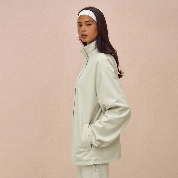 Damen Oversize-Trainingsset mit Stehkragen Ballonärmeln und weiten Kordelhosen Drune