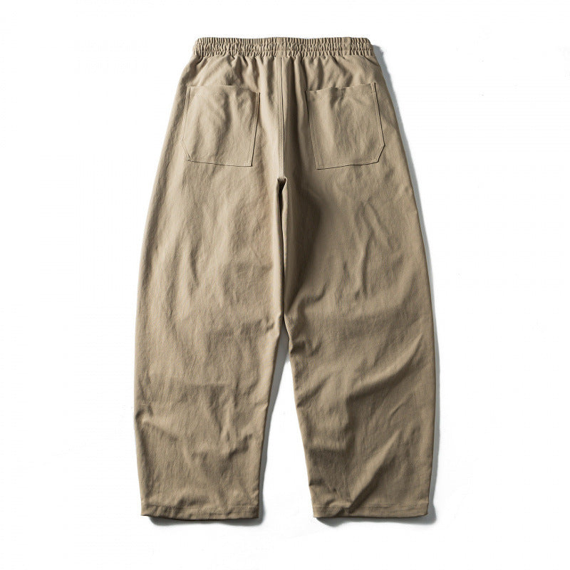 Unisex Weite Cropped-Hose mit Tunnelzug, elastischem Bund und markanten Nahtpaneelen Drune