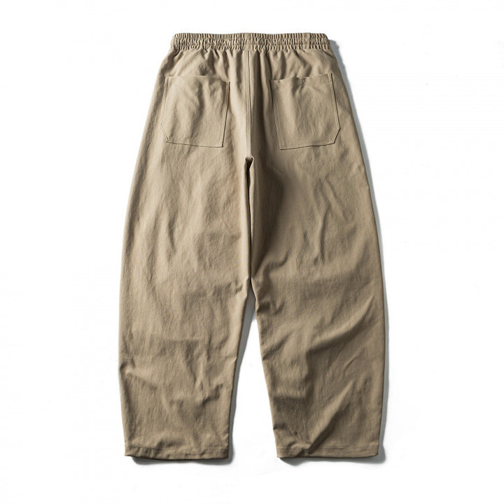 Unisex Weite Cropped-Hose mit Tunnelzug, elastischem Bund und markanten Nahtpaneelen Drune