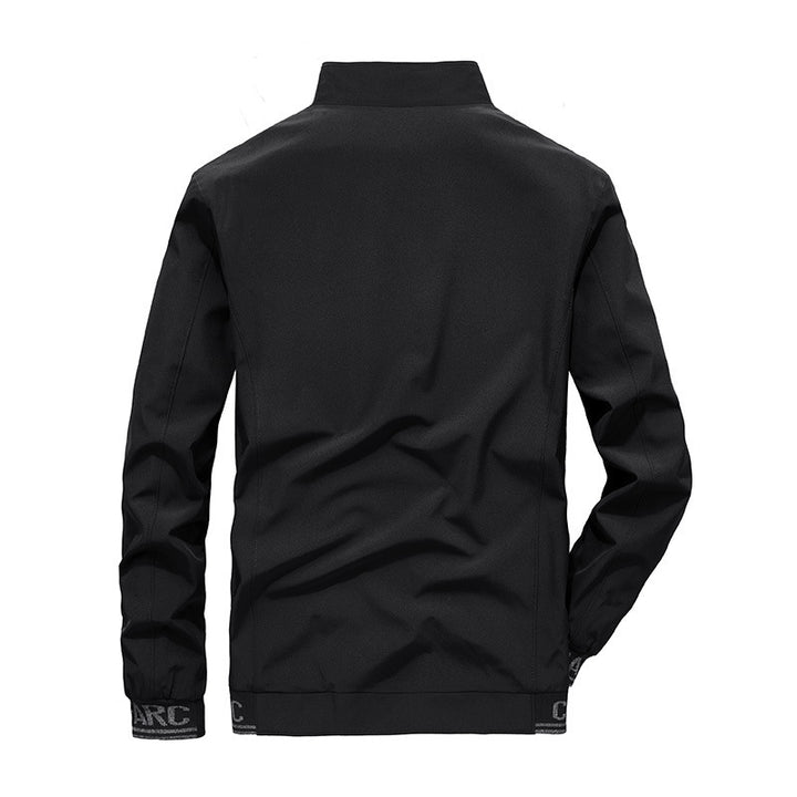 Herren Performance-Softshelljacke mit wärmender Fleecefutter, wind- und wasserabweisender Membran und reflektierenden Akzenten Drune