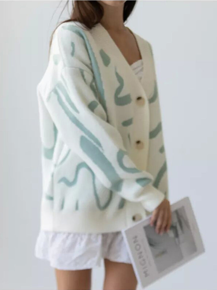 Damen Strickjacke mit modernem Muster und eleganten Knöpfen