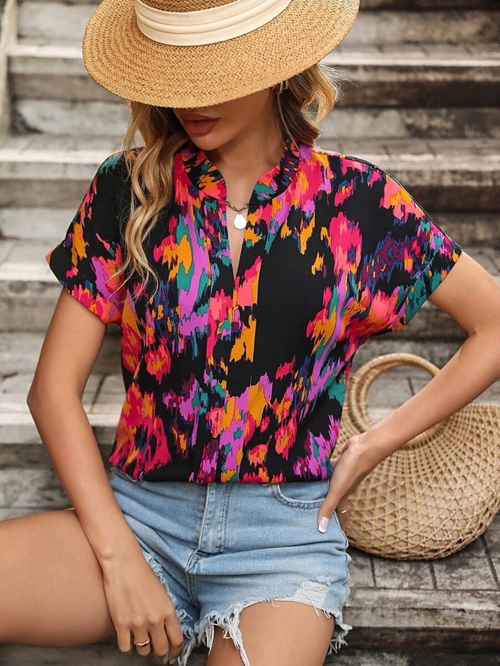 Damen Leichte Oversize Tunika‑Bluse mit Stehkragen, Cap‑Ärmeln und großem Blumenprint Drune
