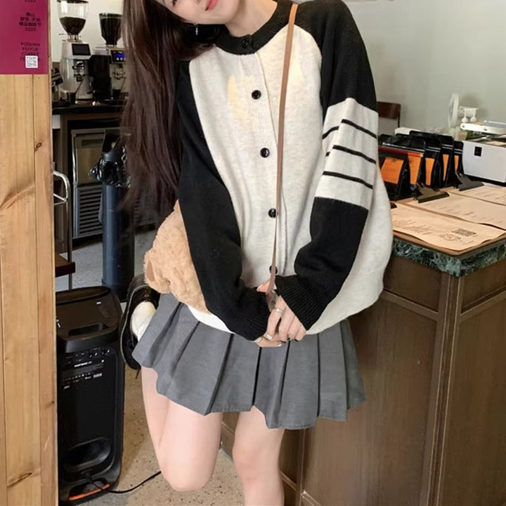 Damen komfortable Strickjacke mit kontrastierenden Ärmeln und Knopfverschluss Drune