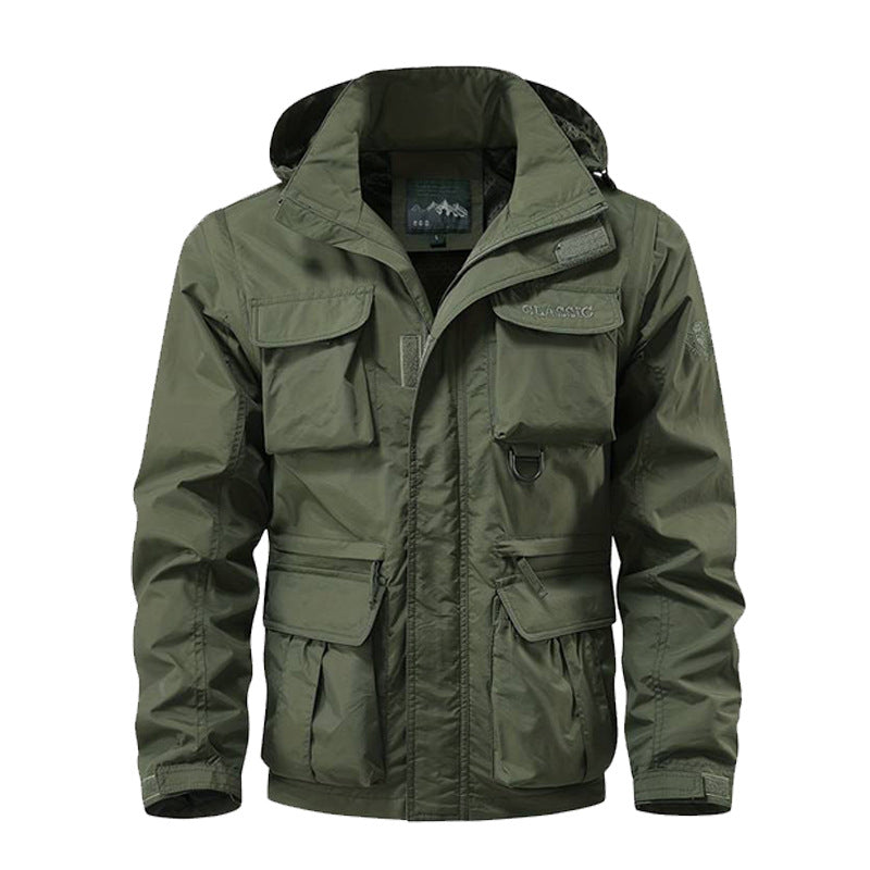Herren nan multifunktionale Fieldjacke mit Kapuze, zahlreichen Klapp- und Reißverschlusstaschen sowie wind- und wasserabweisender Membran Drune