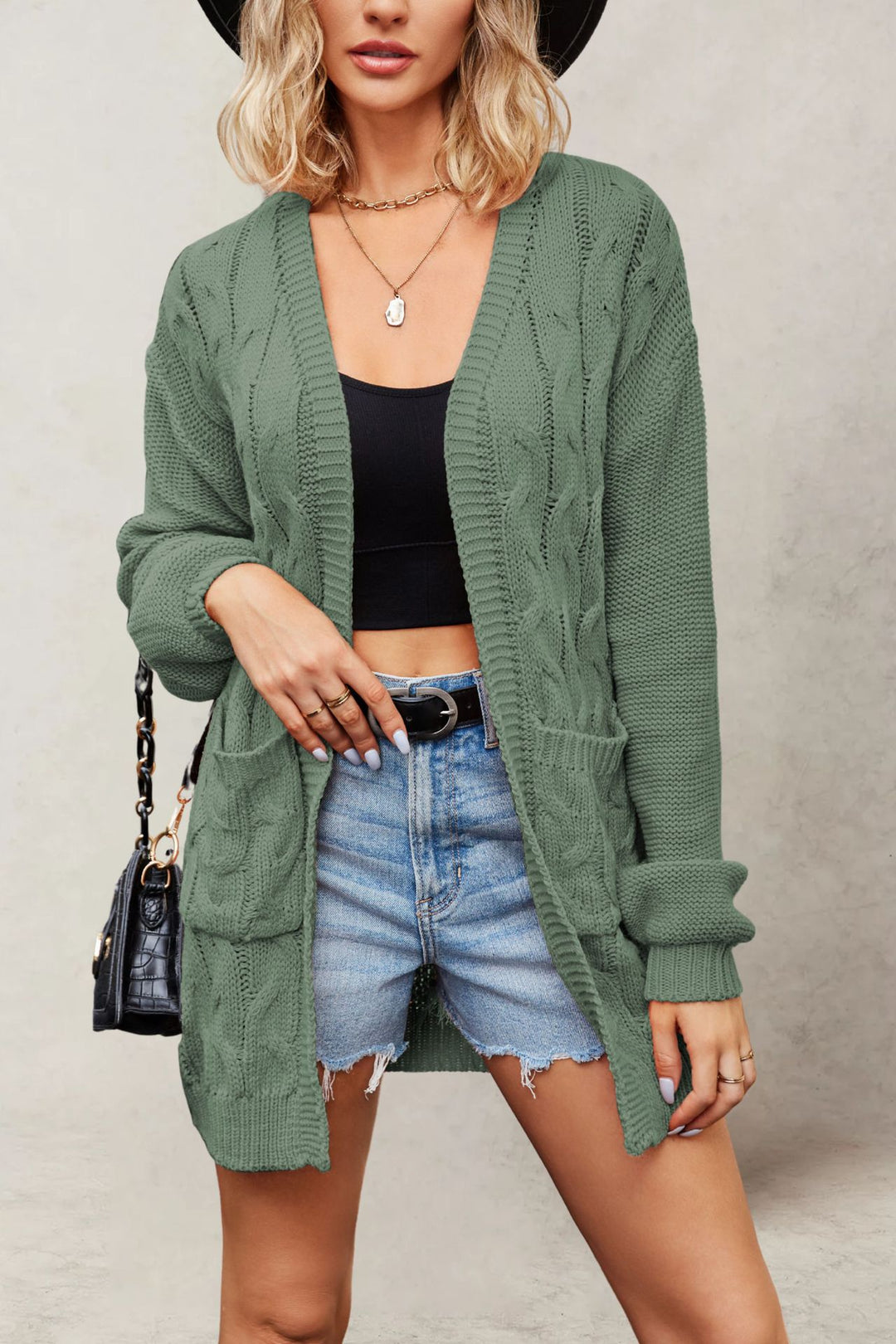 Damen Komfortable Strickjacke mit Taschen und Kabelmuster Drune