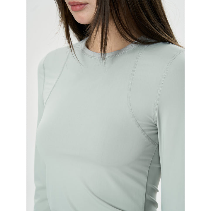 Damen Figurbetontes Langarm‑Funktionsshirt mit Daumenloch und Stretchnähten Drune