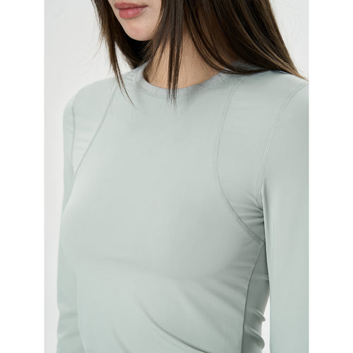 Damen Figurbetontes Langarm‑Funktionsshirt mit Daumenloch und Stretchnähten Drune