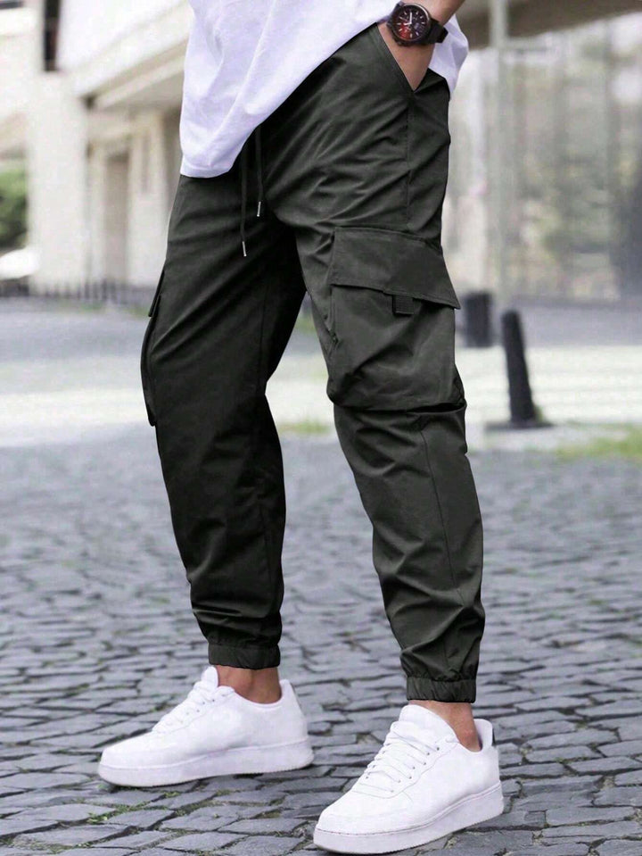 Herren technische Travel-Joggerhose mit integriertem Sicherheitsfach elastischem Tunnelzugbund und wasserabweisender Beschichtung Drune