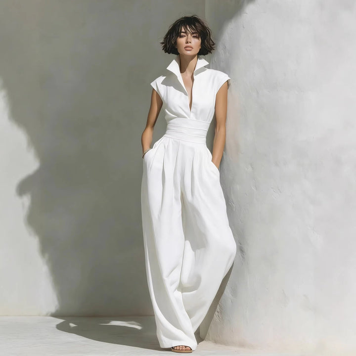 Damen Jumpsuit mit weitem Bein, tailliertem Wickelbund und Stehkragen Drune