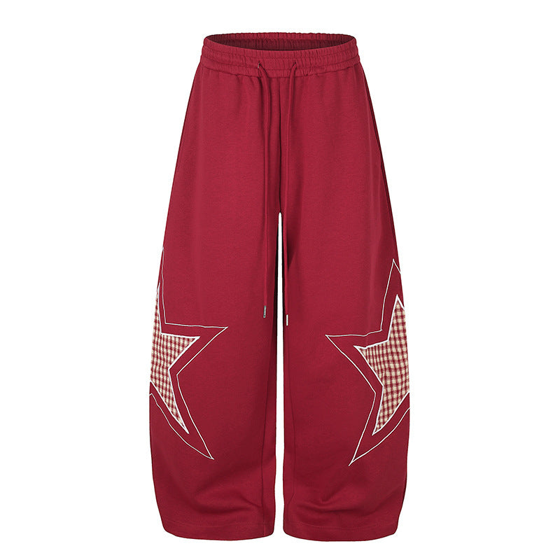 Damen weite Palazzo-Sweathose mit Stern-Applikationen und Karo‑Einsätzen Drune