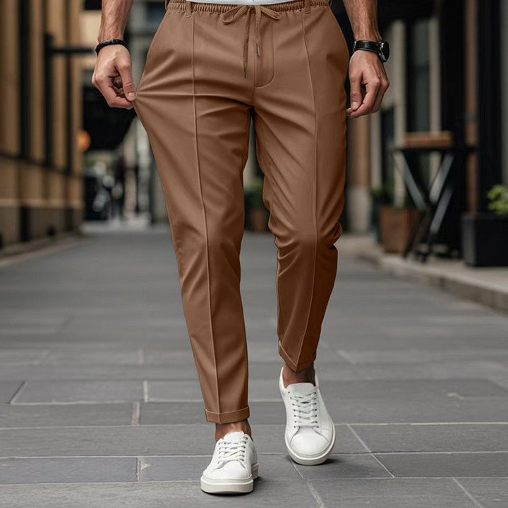 Herren nan moderne tapered Jogginghose mit Bügelfalte und Kordelzug Drune