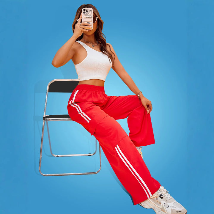Damen weite Sporthose mit seitlichen Streifen und Cargo-Taschen Drune
