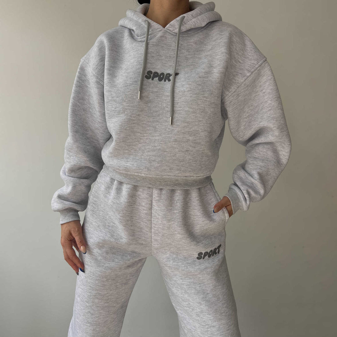 Damen modisches sportliches Set mit cropped Hoodie und weiten Jogginghosen Drune