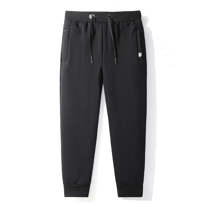 Herren Minimalistische Tech-Jogginghose mit Slim-Fit, Elastikbund und verdeckten Reißverschlusstaschen Drune