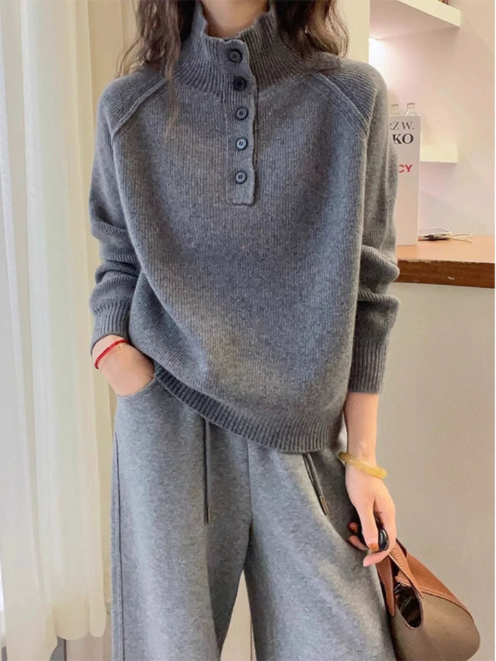 Damen Grobstrickpullover mit hochstehenden Kragen und dekorativen Knöpfen Drune