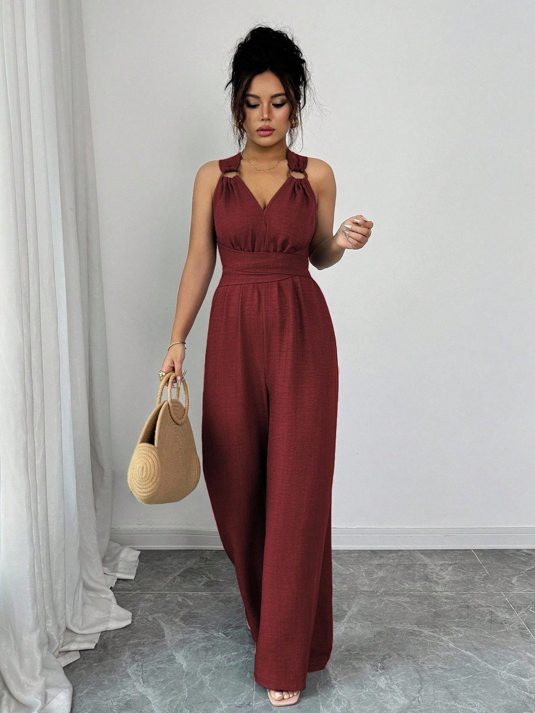 Damen Jumpsuit mit weitem Bein, tailliertem Wickelband und Ösen-Trägern Drune