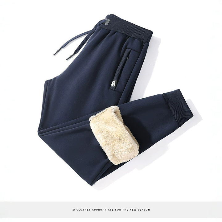 Herren Minimalistische Tech-Jogginghose mit Slim-Fit, Elastikbund und verdeckten Reißverschlusstaschen Drune