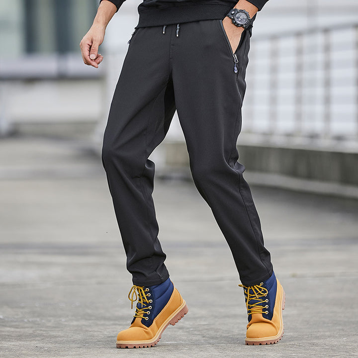 Herren Technische Softshell-Jogginghose mit wasserabweisender Membran, Reißverschlusstaschen und elastischem Kordelbund Drune