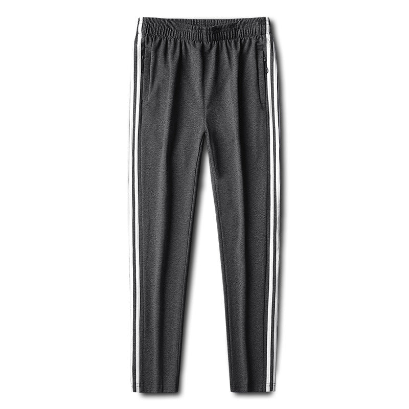 Herren Slim-Fit Trackhose mit seitlichen Kontraststreifen, Reißverschlusstaschen und elastischem Bund Drune