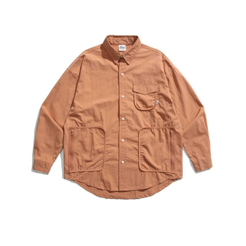 Unisex Boxy-Überhemdjacke mit Utility-Taschen, abgerundetem Saum und Oversize-Passform Drune