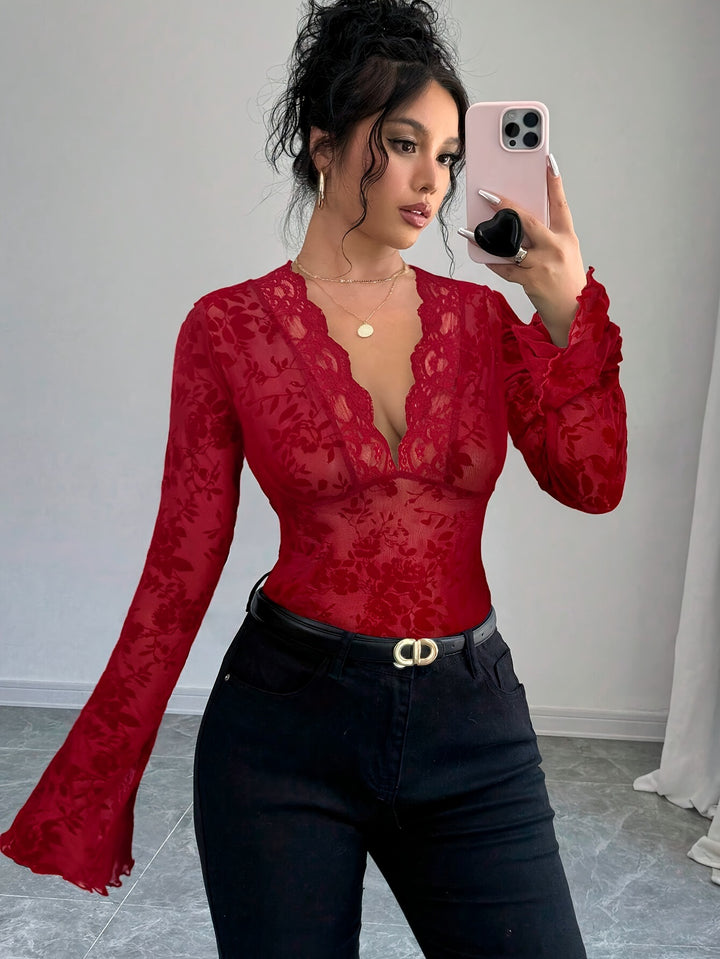 Damen nan eng anliegende transparente Mesh-Spitzenbluse mit tiefem V-Ausschnitt und floraler Veloursstruktur Drune