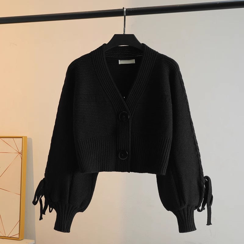 Damen modische Strickjacke mit voluminösen Ärmeln und Knopfdetails Drune