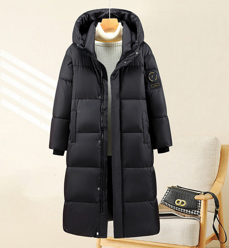 Damen nan extralang gesteppter Thermoparka mit ergonomischer Kapuze, innenliegenden Rippbündchen und verdeckter Frontblende Drune