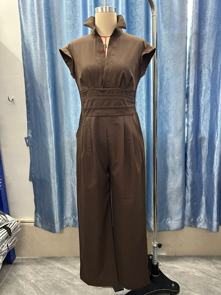 Damen Jumpsuit mit weitem Bein, tailliertem Wickelbund und Stehkragen Drune