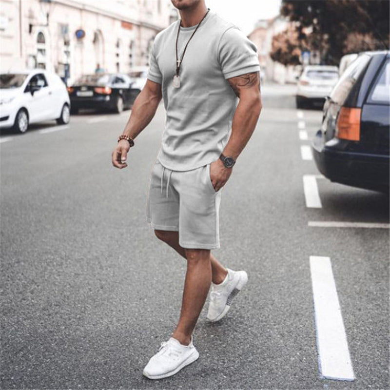 Herren nan figurbetontes Kurzarmshirt mit verstärkter Schulternaht und elastischer Kordelzug-Bermuda aus Stretchjersey Drune