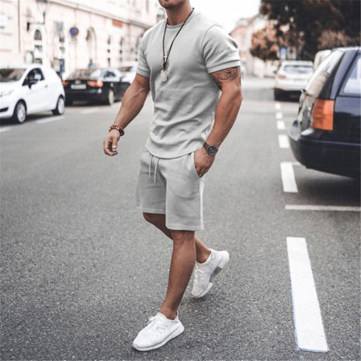 Herren nan figurbetontes Kurzarmshirt mit verstärkter Schulternaht und elastischer Kordelzug-Bermuda aus Stretchjersey Drune