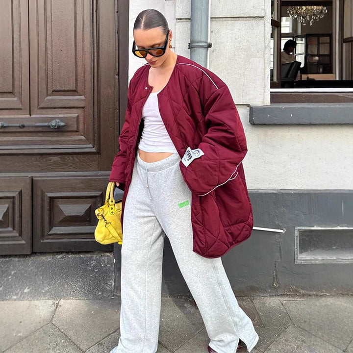 Damen Oversize-Steppjacke mit Diamantstepp, kontrastierender Paspel und Druckknopfverschluss Drune